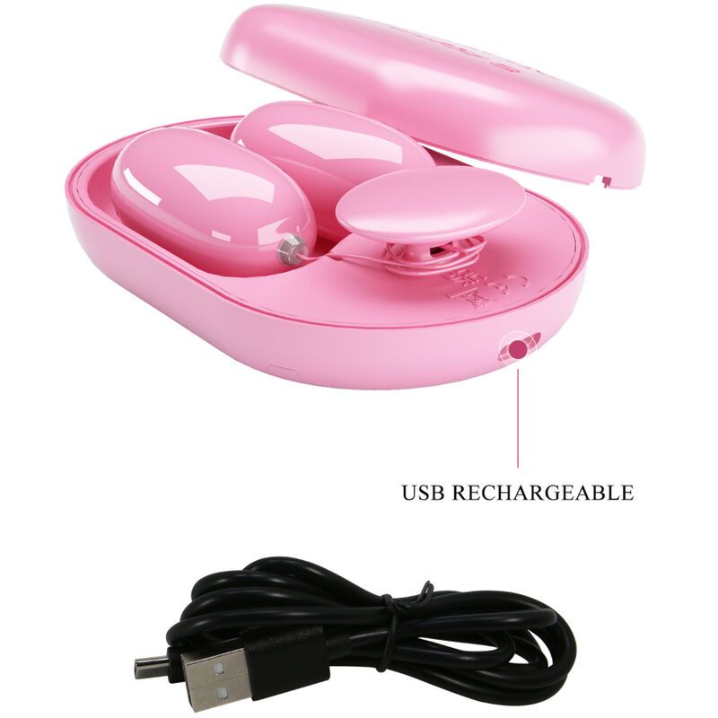 Rosa Kugeln mit Ladeschale und USB-Kabel. Die Ladeschale hat einen USB-Anschluss. Auf der Schale steht "USB RECHARGEABLE".