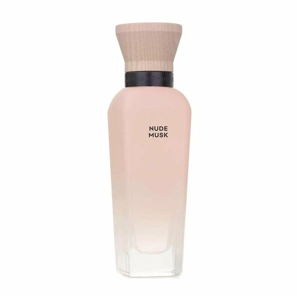 Parfümflasche mit Holzverschluss. Aufschrift: NUDE MUSK. Farbverlauf von rosa nach transparent.