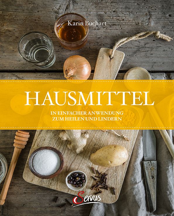 Buchcover mit Titel „Hausmittel“. Gelber Balken mit Text. Auf Holzbrett: Zwiebel, Ingwer, Kartoffel, Gewürze, Honig, Salz, Glas.