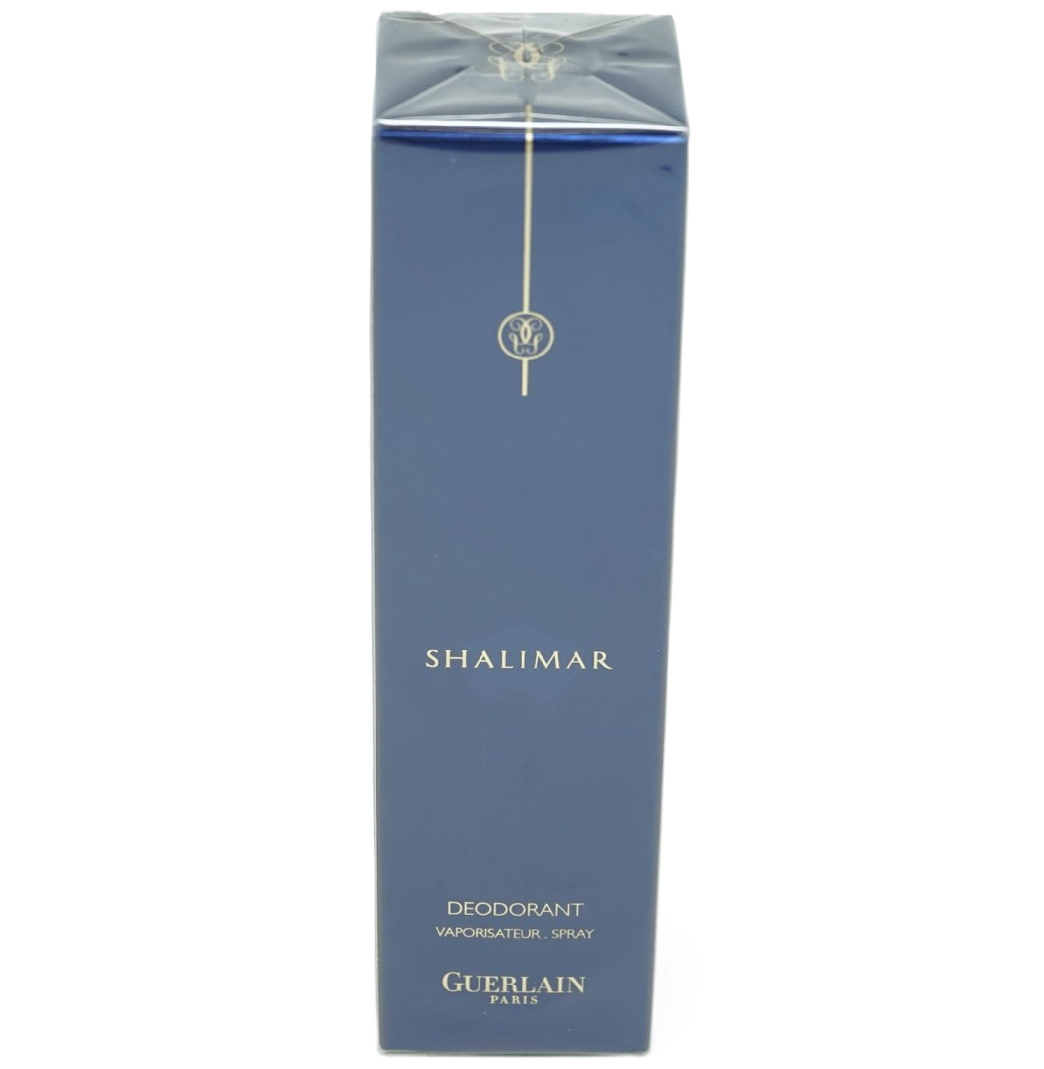 Blau-graue Schachtel. Aufschrift: SHALIMAR, DEODORANT VAPORISATEUR SPRAY, GUERLAIN PARIS. Oben transparente Folie.