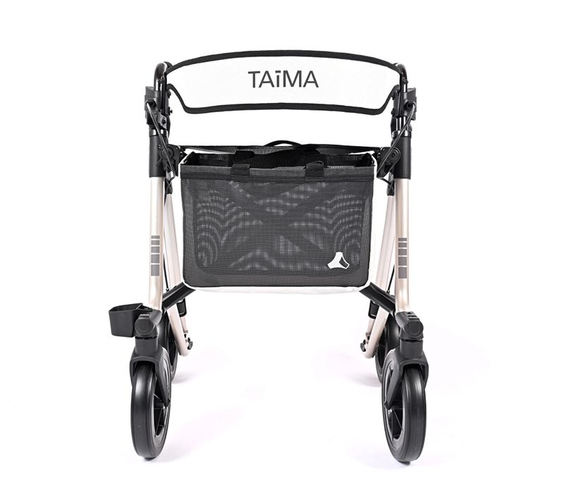 Rollator mit vier Rädern, schwarzem Korb und Sitzfläche. Der Schriftzug TAiMA ist auf der Rückenlehne zu sehen.