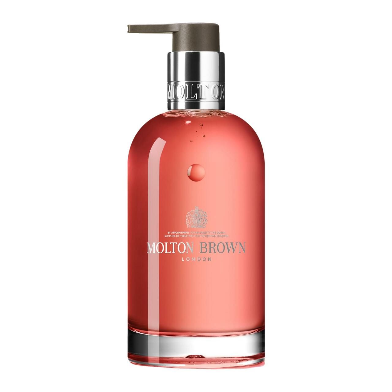 Glasflasche mit rosa Flüssigkeit und silbernem Pumpkopf. Aufschrift: Molton Brown London.