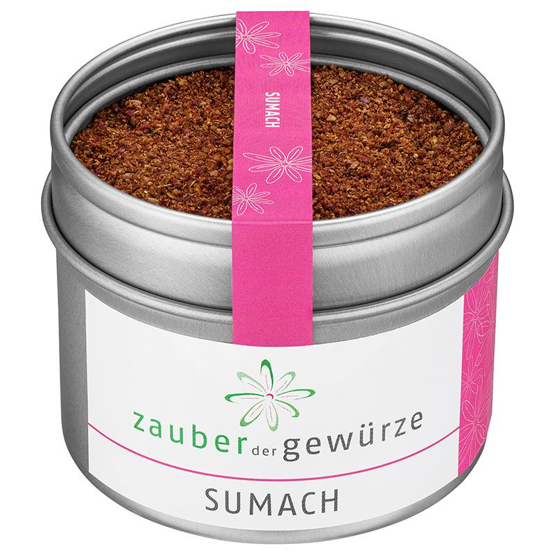 Runde Dose mit Sumach-Gewürz. Rosa Etikett mit Blumenmuster und Produktnamen. Weißes Etikett mit Schriftzug "Zauber der Gewürze".