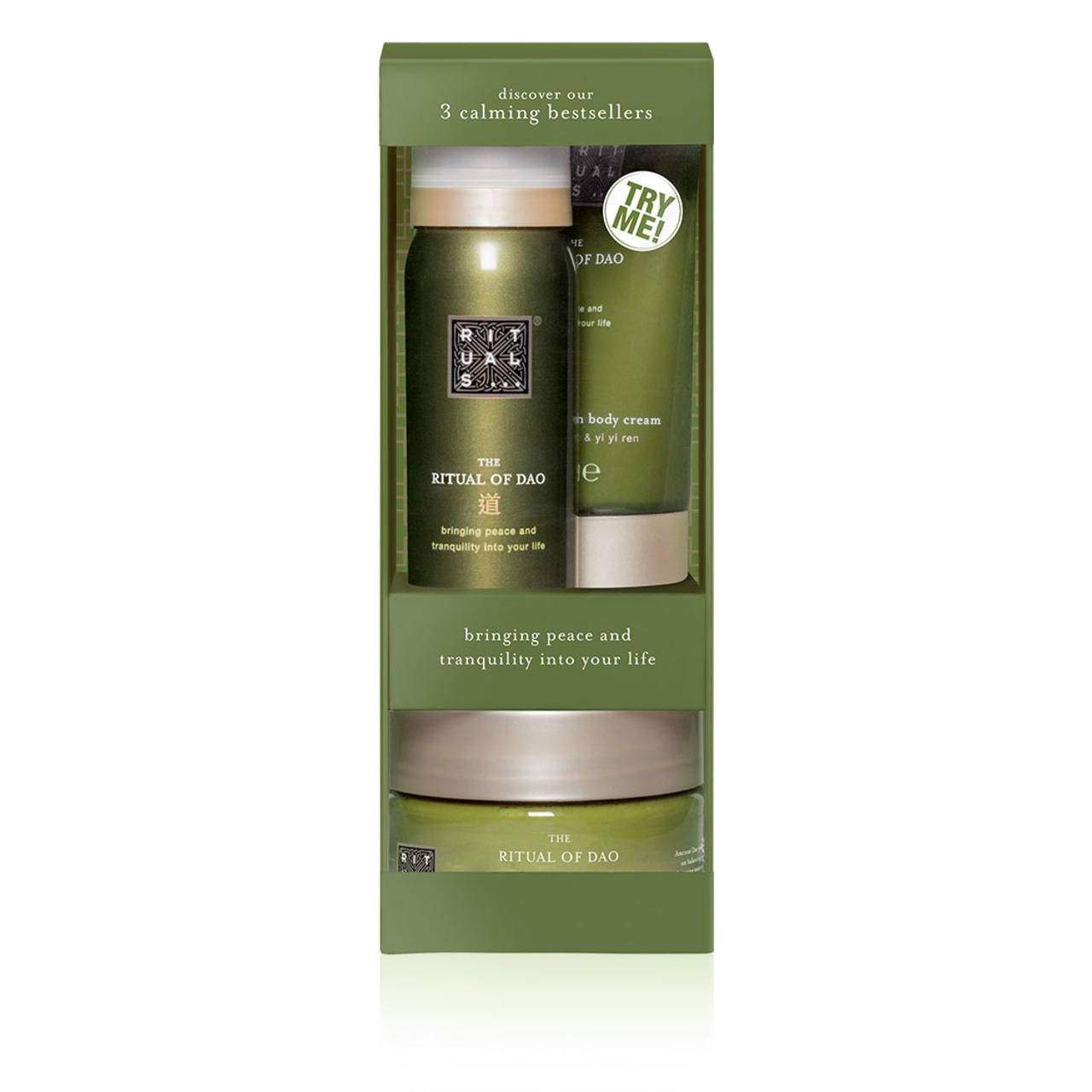 Geschenkset mit drei Produkten: Spray, Creme und Peeling. Grüne Verpackung mit Produktnamen und Logo.