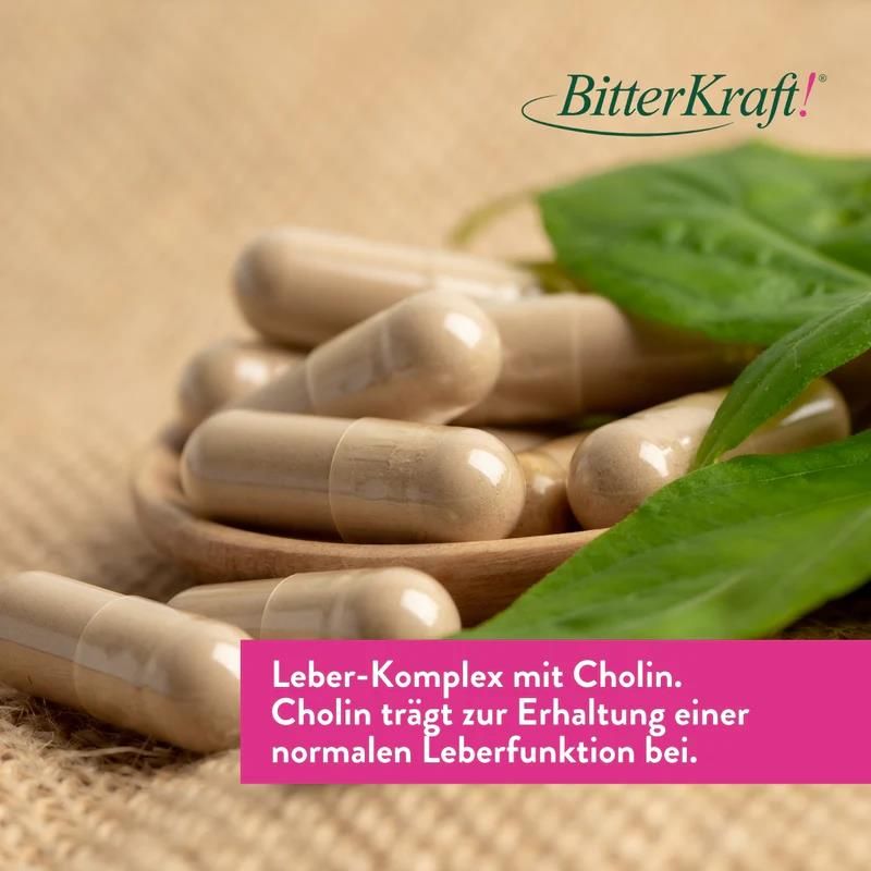 Kapseln in Holzschale. Text: Leber-Komplex mit Cholin. Cholin trägt zur Erhaltung einer normalen Leberfunktion bei.