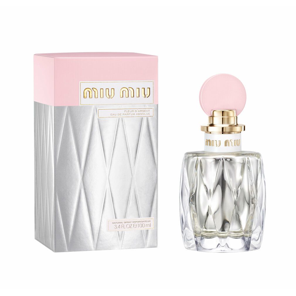Parfümflakon und Verpackung. Flakon quadratisch, Diamantmuster, rosa Deckel. Verpackung rosa/silber, Miu Miu Logo.