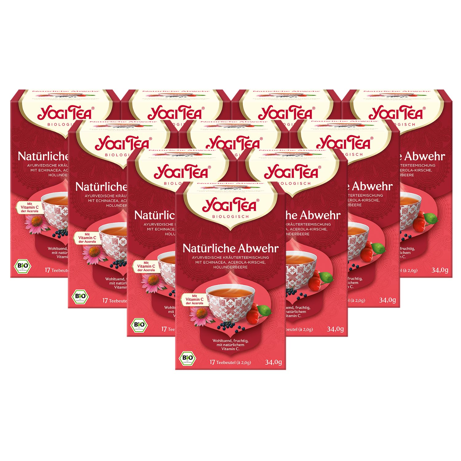 Mehrere Packungen Kräutertee mit dem Logo von Yogi Tea. Aufdruck "Natürliche Abwehr". Bio-Siegel. Rote Verpackung mit Abbildung einer Tasse Tee.