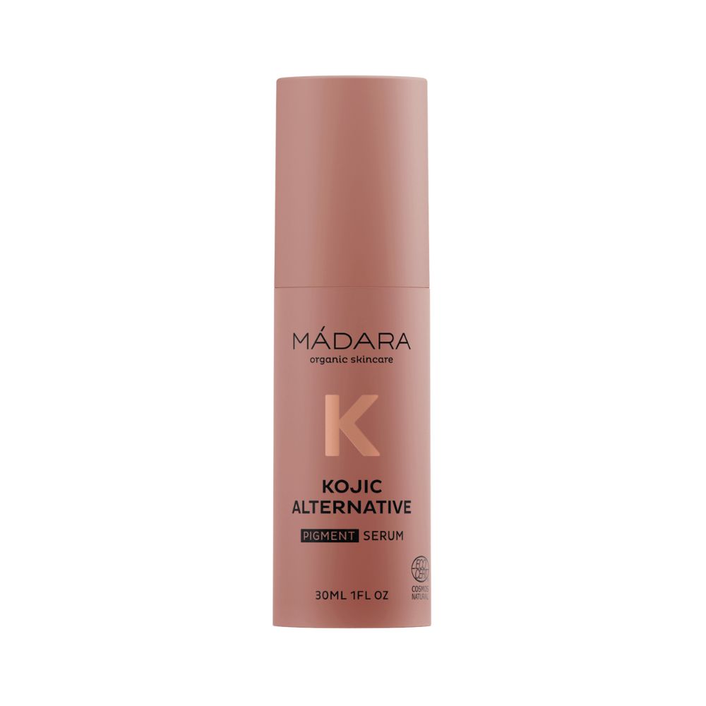 Zylindrische Flasche. Aufschrift: MÁDARA organic skincare, K, KOJIC ALTERNATIVE PIGMENT SERUM. Volumen: 30ML 1FL OZ. Mit Bio-Siegel.
