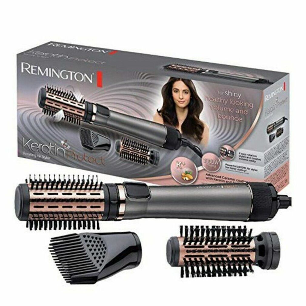Verpackung mit Haartrockner und Zubehör. Marke Remington. Abbildung einer Frau mit glänzendem Haar.