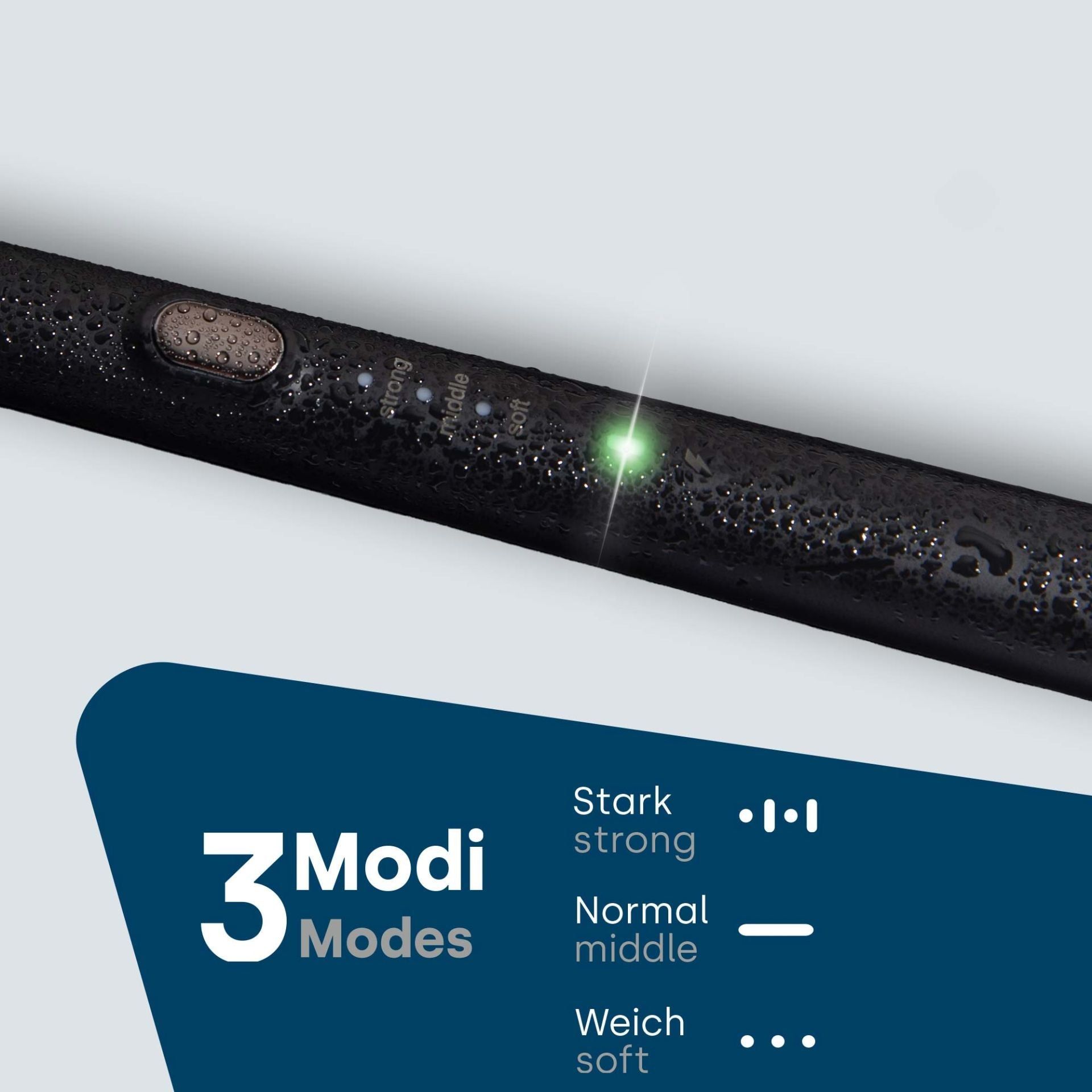 Nahaufnahme der schwarzen elektrischen Zahnbürste. 3 Modi: Stark, Normal, Weich. Grüne LED-Anzeige.