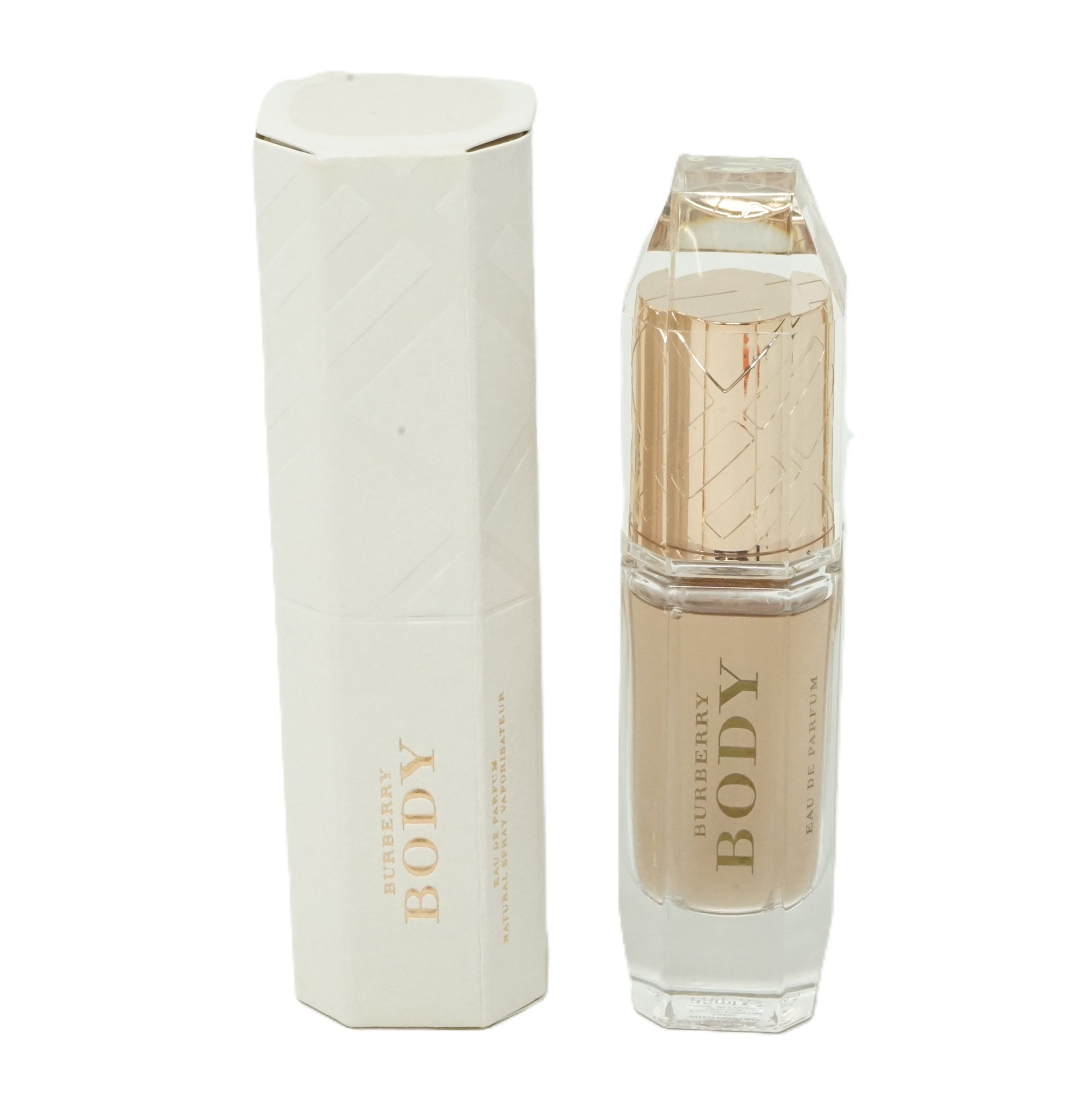 Parfümflakon und Verpackung. Flakon mit goldfarbenem Deckel und Schriftzug BODY. Verpackung in Weiß mit Schriftzug BODY.