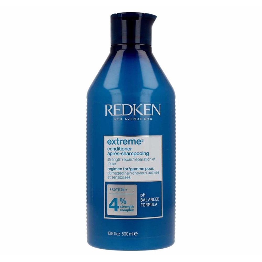 Blaues Redken Extreme Conditioner. Flasche mit weißem Etikett. Text: Extreme, strength repair, pH Balanced Formula, 500ml.