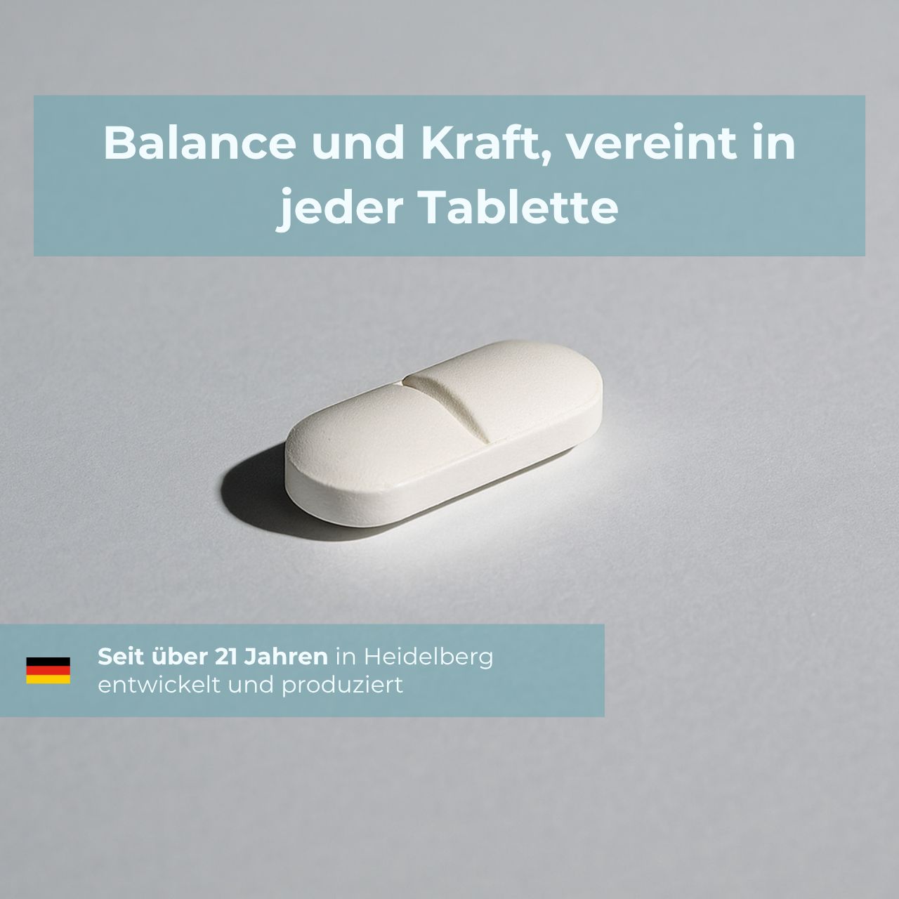 Weiße, teilbare Tablette auf hellem Hintergrund. Text: Balance und Kraft, vereint in jeder Tablette.