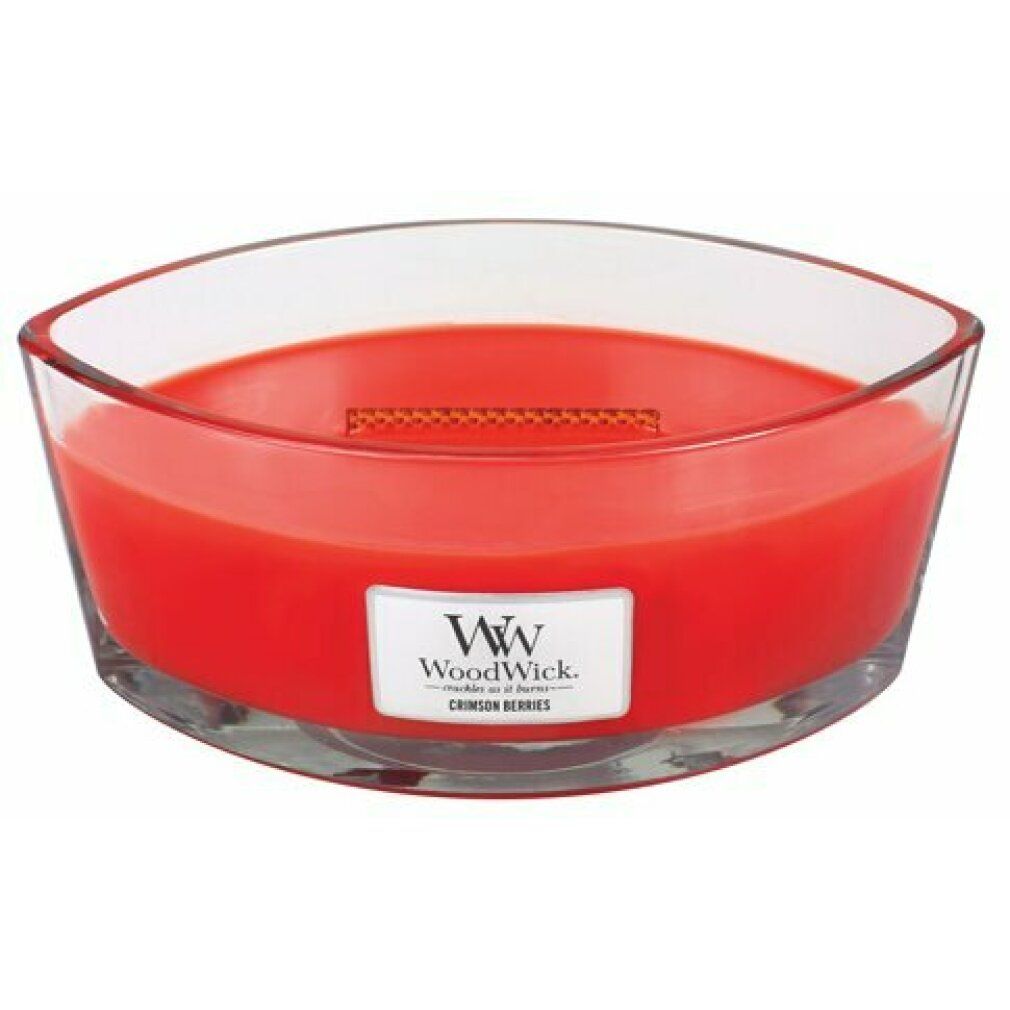 Rote Kerze in elliptischer Glasform. Etikett mit 'Crimson Berries'. Holzdocht sichtbar.