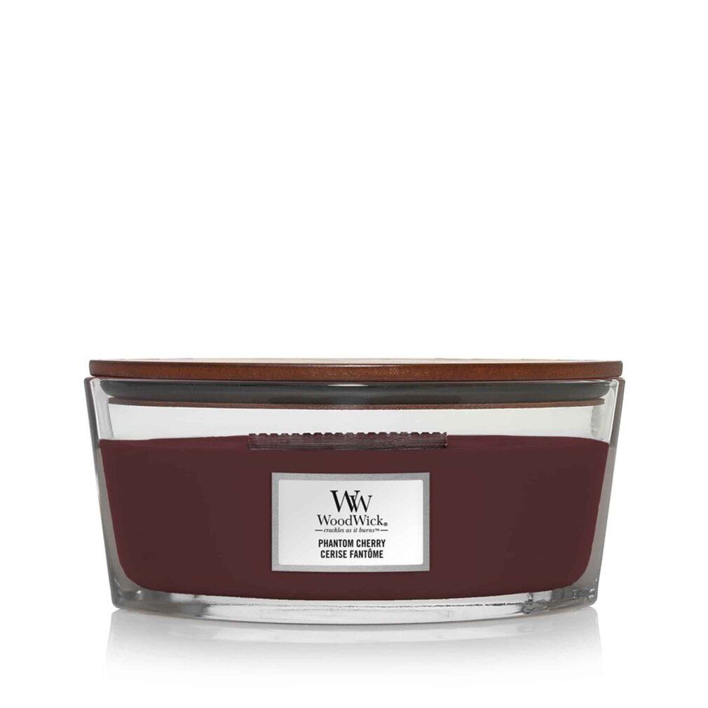 Glasbehälter mit rotem Wachs und Holzdeckel. Etikett mit Logo und Produktnamen. Rechteckige Form.