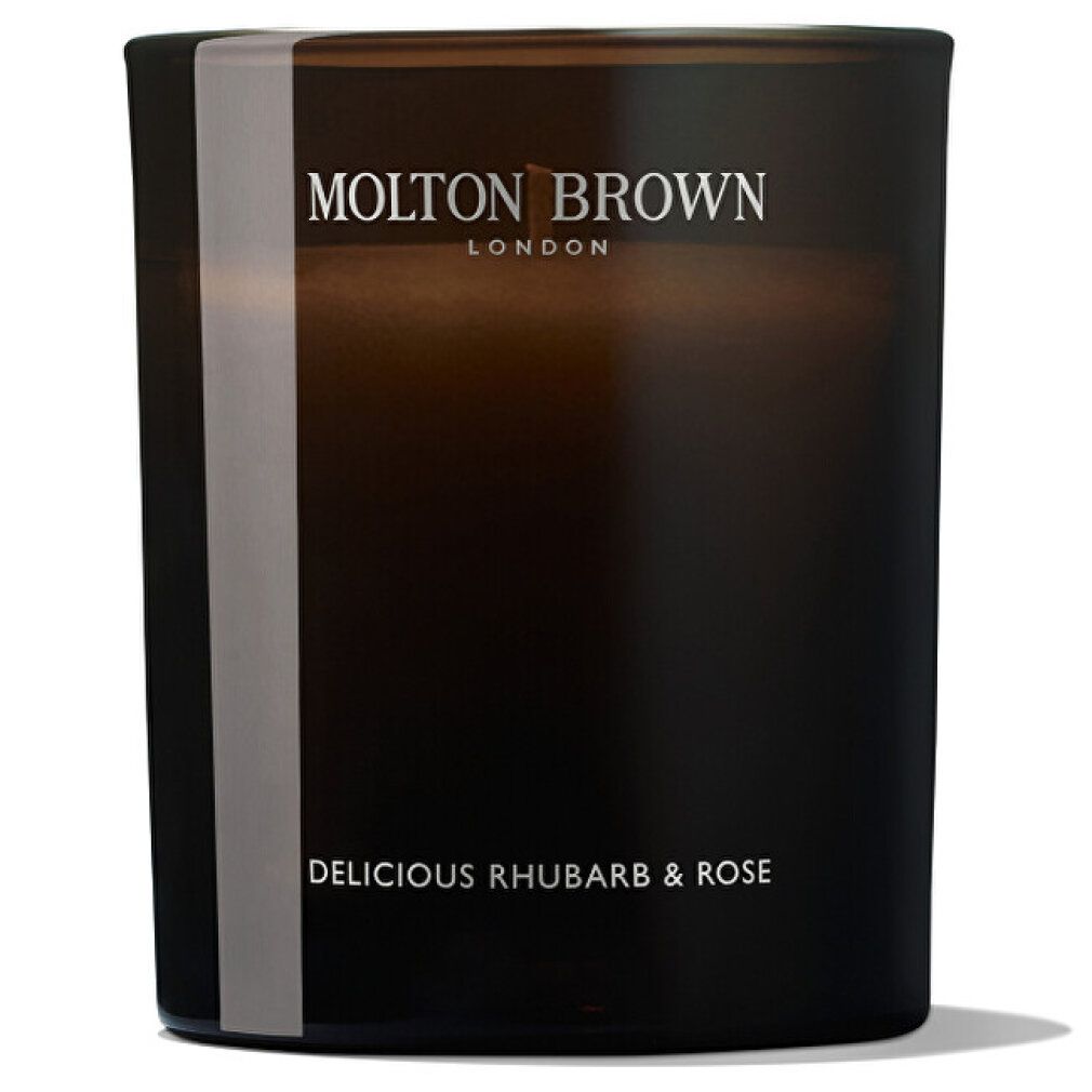 Braune Glas-Duftkerze mit weißem Streifen. Aufschrift: Molton Brown London, Delicious Rhubarb & Rose.