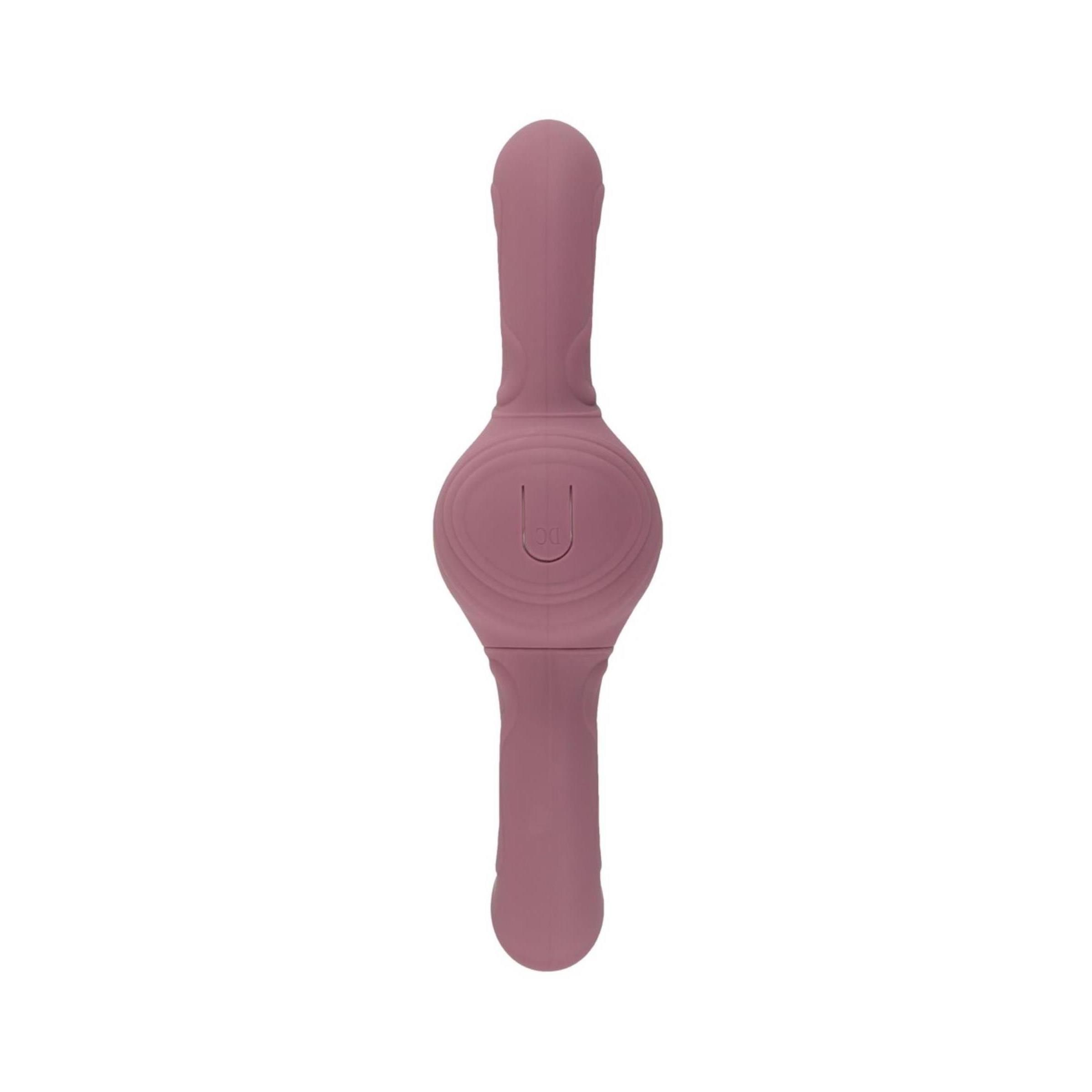 Rosa Vibrator mit zwei Enden und einem runden Mittelteil. Das Produkt hat das Logo "U".