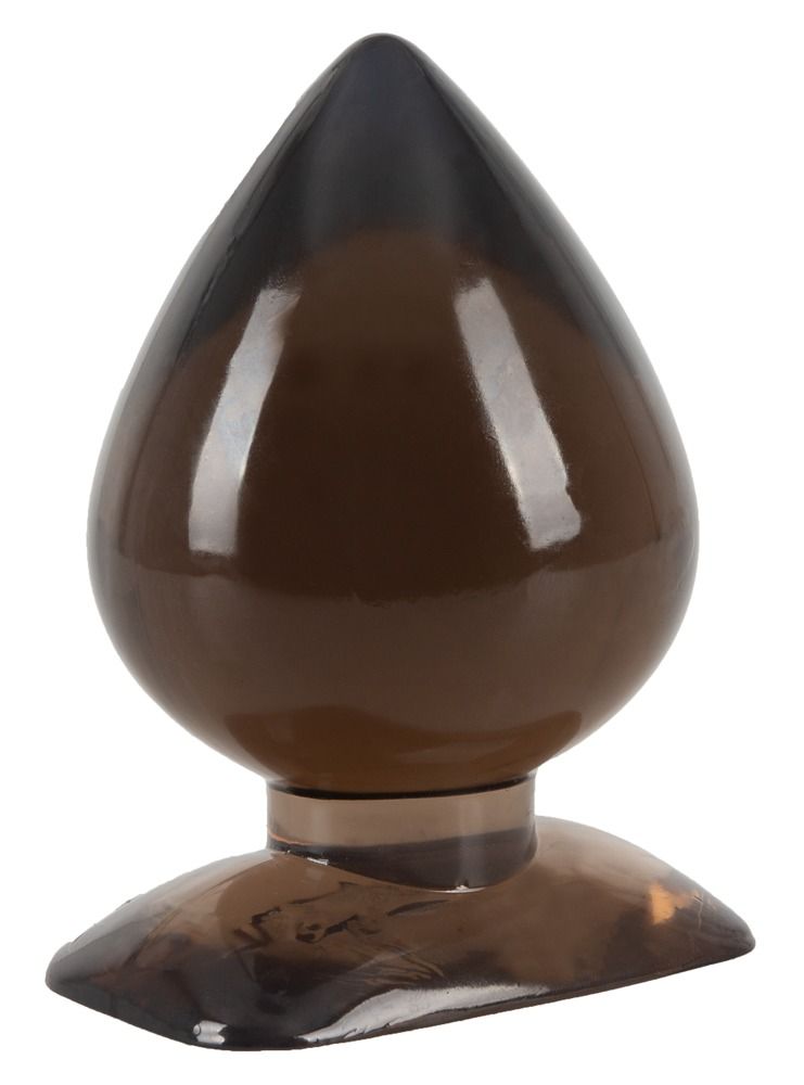 Analplug, braun getönt, Tropfenform. Spitze und Basis dunkler. Liegt auf der Seite. Glatte Oberfläche. Breiter Basis.