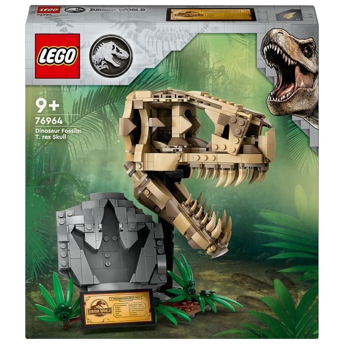 LEGO Jurassic World 76964 Fossili di Dinosauro: Teschio di T. Rex. Un set di costruzioni per bambini dai 9 anni in su. Il set mostra un teschio di T. Rex fatto di mattoncini LEGO beige e marroni, posto su una base grigia. La confezione presenta il logo LEGO e il logo Jurassic World.