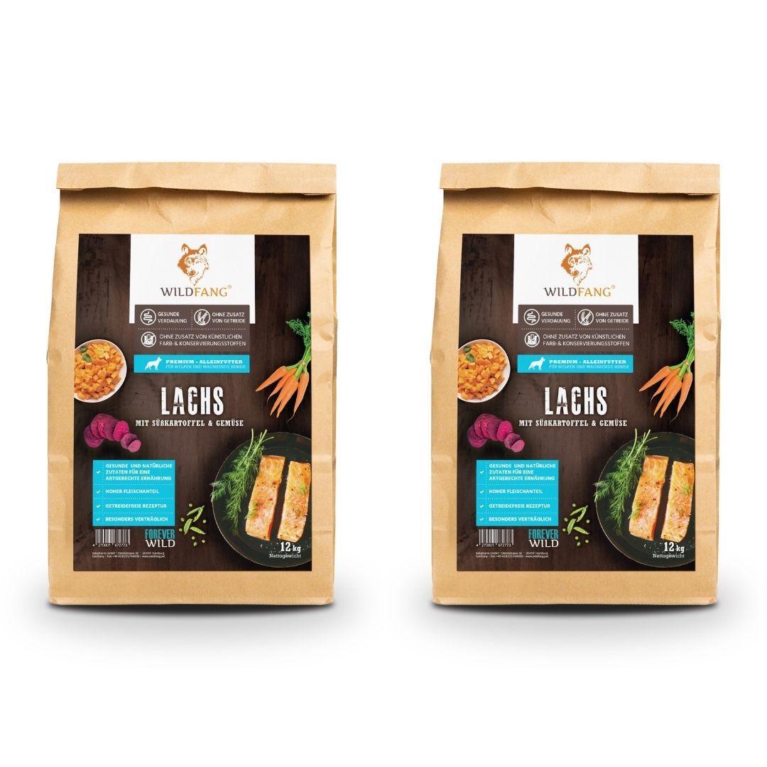 Zwei identische Beutel Trockenfutter mit Lachs. Marke: WILDFANG. Text: Lachs mit Süßkartoffeln & Gemüse.