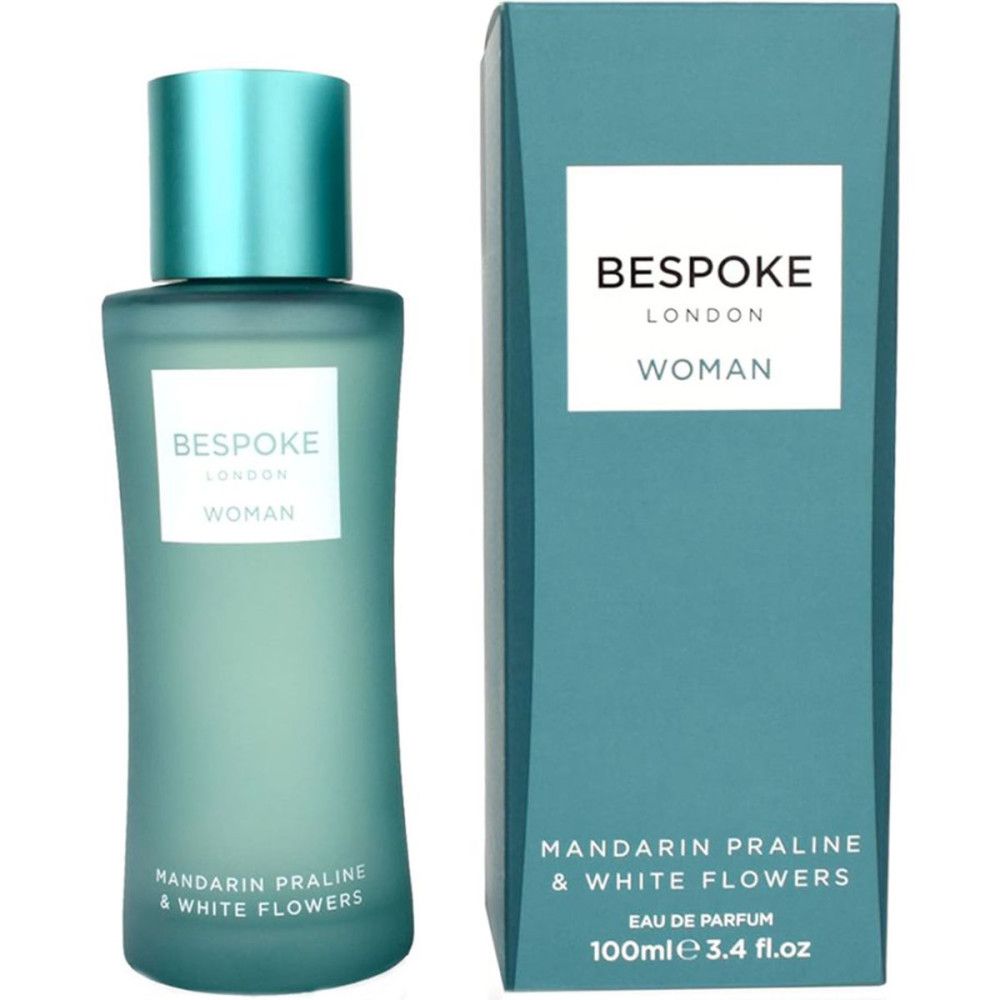 Flakon und Schachtel. Aufschrift: Bespoke London Woman, Mandarine Praline & Weiße Blumen. Türkisgrün. Rechteckige Schachtel.
