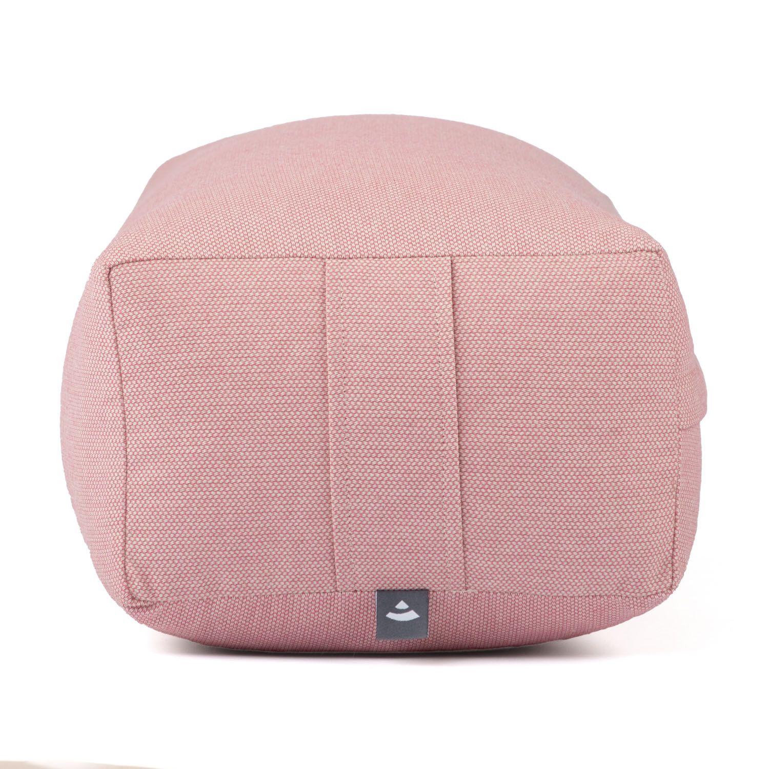 Rosa Yoga-Bolster mit Logo. Rechteckige Form mit abgerundeten Ecken. Stoffstruktur sichtbar.