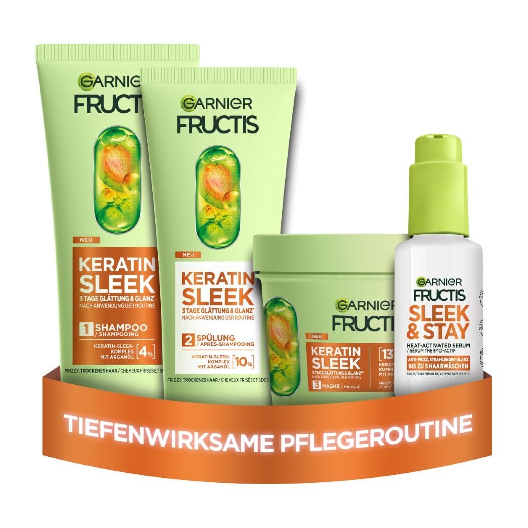 Garnier Fructis Keratin Sleek Pflegeset. Enthält Shampoo, Spülung, Maske und Serum. Grüne und weiße Verpackungen mit Produktnamen.