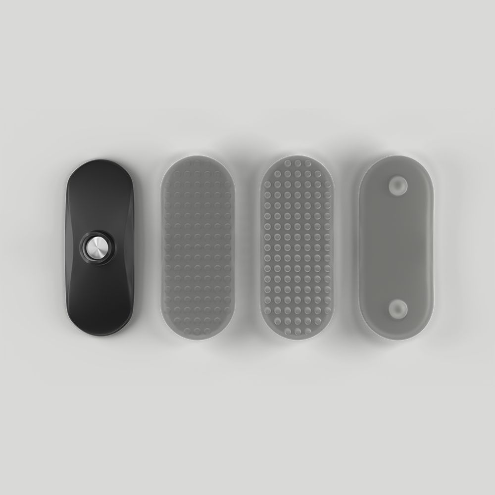 Vier Aufsätze für ein Massagegerät. Schwarz und grau. Unterschiedliche Oberflächenstrukturen: Noppen, Punkte, glatt.