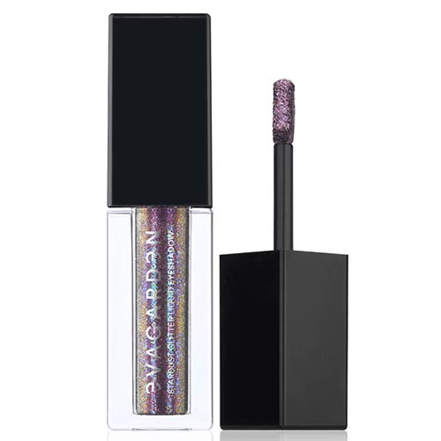 Flüssiger Lidschatten in Glasflasche mit schwarzem Deckel. Applikator mit violettem Glitter. Text: STARDUST GLITTER LIQUID EYESHADOW.