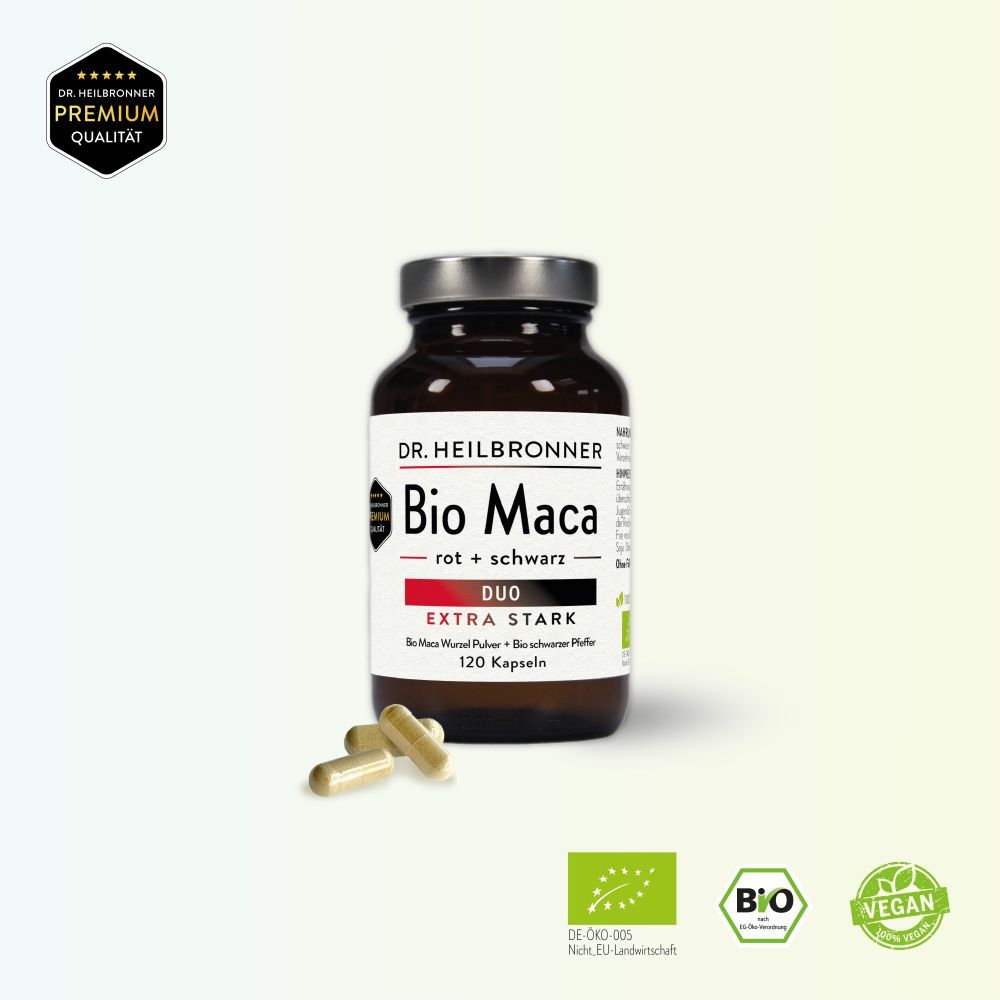 Braune Glasflasche mit silbernem Deckel. Etikett "Bio Maca Duo". 3 Kapseln daneben. Bio-Siegel.