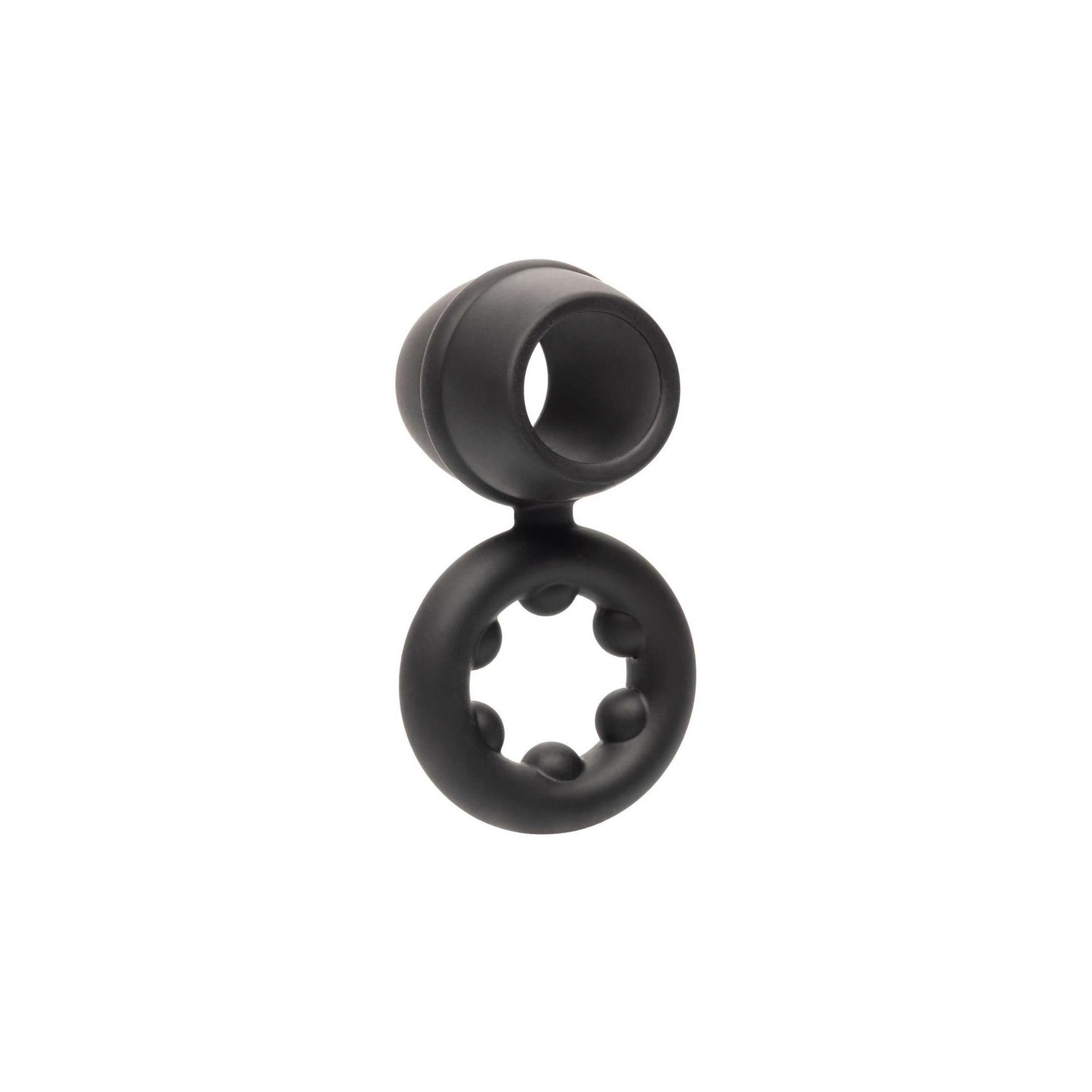 Schwarzer Ring mit zwei Öffnungen. Eine größere Öffnung und eine kleinere, mit Kugeln versehene Öffnung.