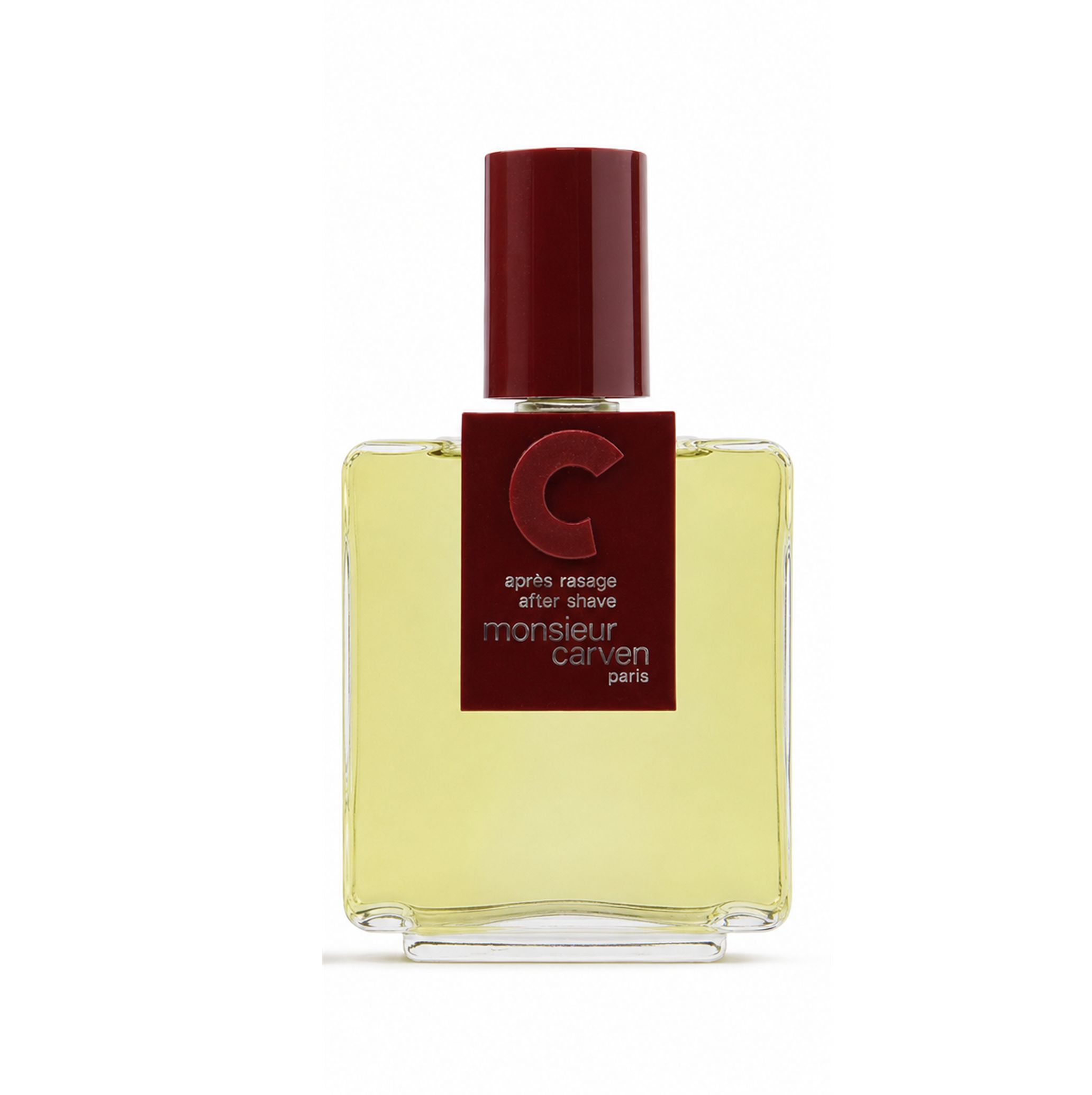Monsieur de Carven After Shave Lotion Flakon. Dunkelrotes Etikett mit 'C'-Logo, Produktnamen und 'Paris'.