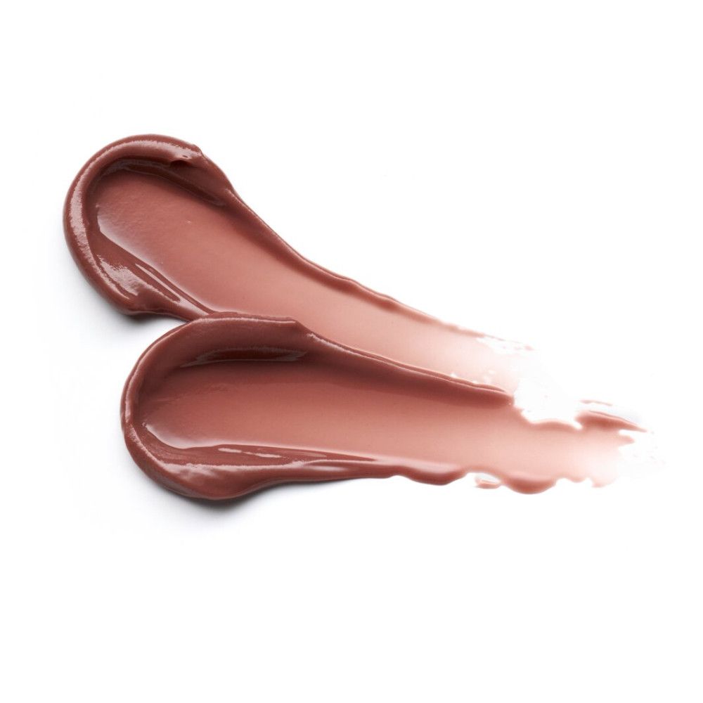 Zwei cremige Lippenbalsam-Striche in Rosa-Braun-Tönen auf weißem Hintergrund. Glänzende Textur.