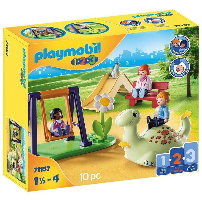 Playmobil 1.2.3 set da gioco 71157. La confezione mostra un set da gioco con scivolo, altalena, panchina e personaggio dinosauro. Sono raffigurate anche figure di bambini. Il set è adatto a bambini da 1,5 a 4 anni e contiene 10 pezzi.