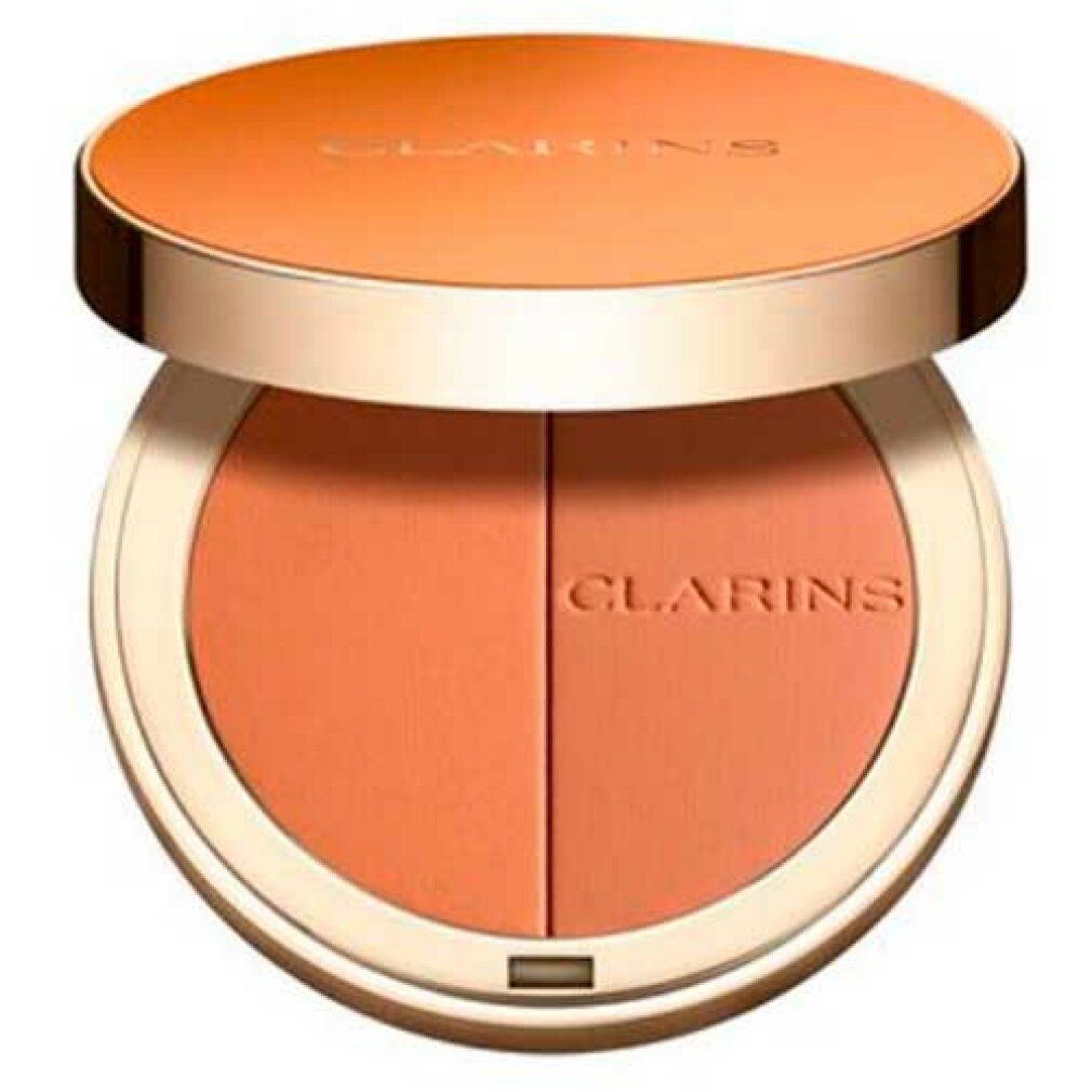 Runder Bronzer-Kompaktpuder mit zwei Farbtönen. Deckel und Puder in Orange- und Goldtönen. Marke Clarins.