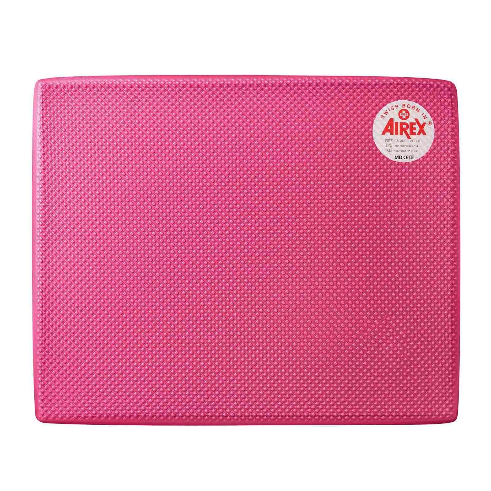 Rosa Balance-Pad. Rechteckige Form mit strukturierter Oberfläche. Airex-Logo mit Schweizer Herkunft.