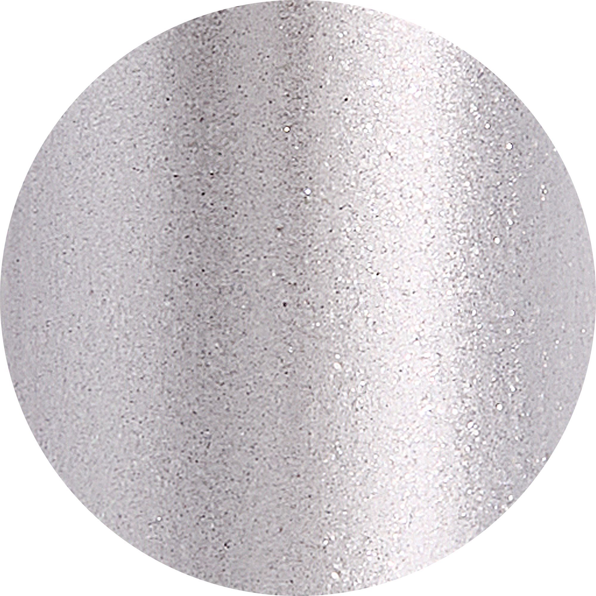 Un ritaglio circolare che mostra un liquido argentato con glitter. La consistenza è liscia e lucida, con piccole particelle scintillanti che riflettono la luce.