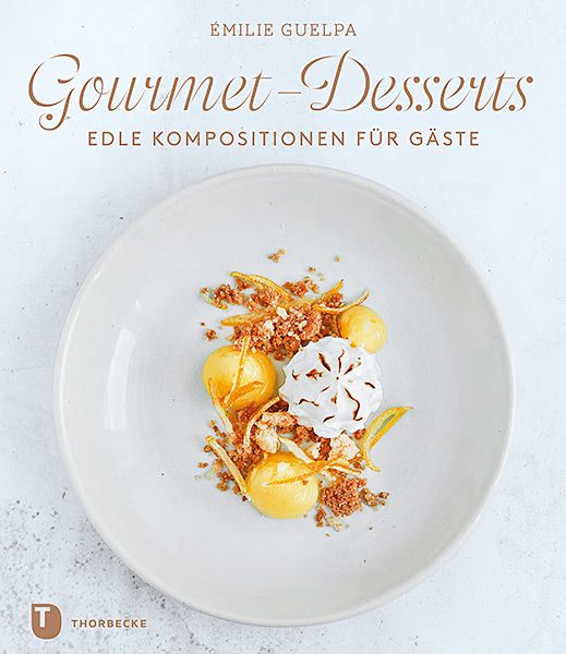 Buchcover mit Titel "Gourmet-Desserts". Auf einem Teller angerichtete Speise mit gelben Kugeln und weißem Gebäck.