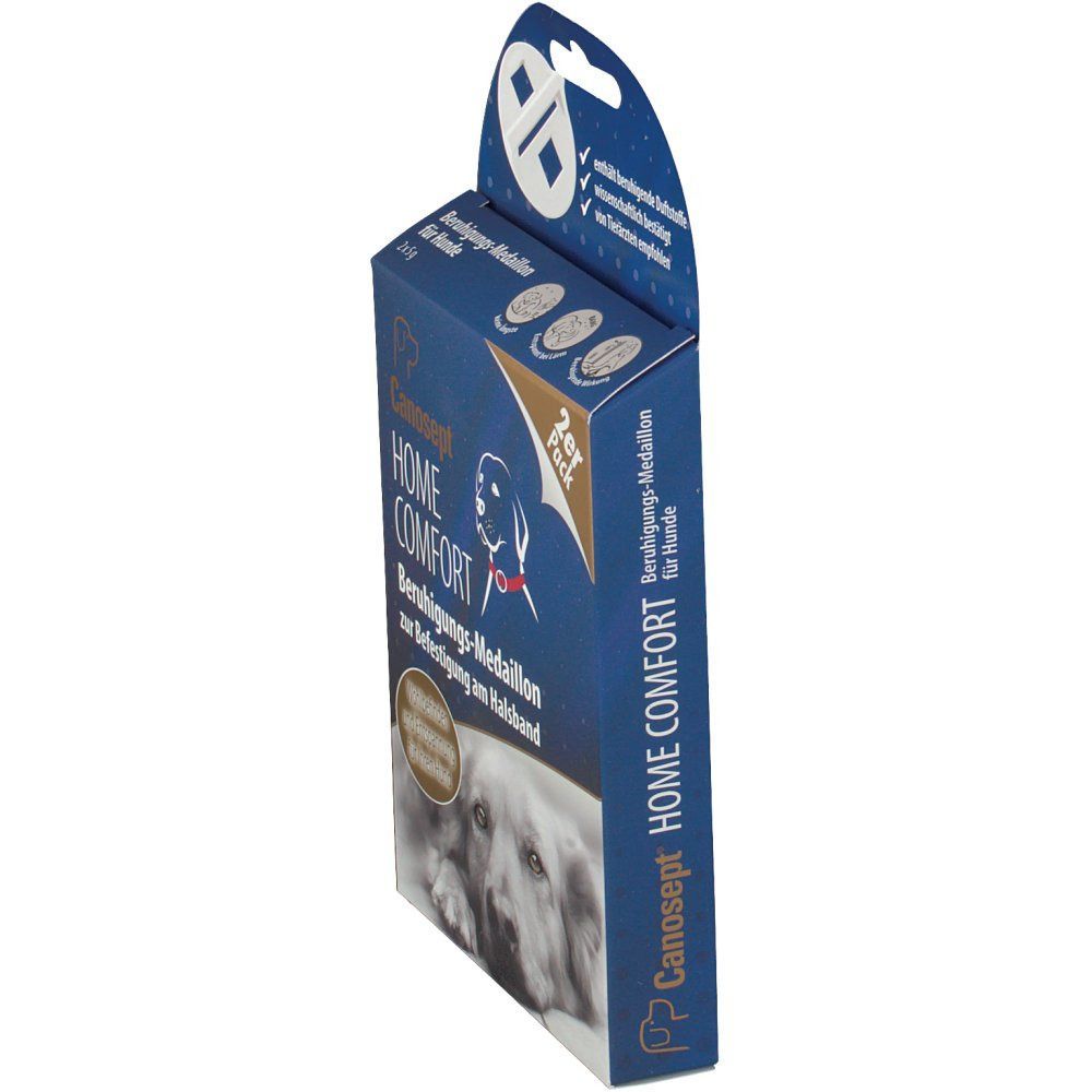 Blau-weiße Produktverpackung mit Canosept HOME COMFORT-Logo. Text: Beruhigungs-Medaillon für Hunde. 2er Pack. Hundefoto.