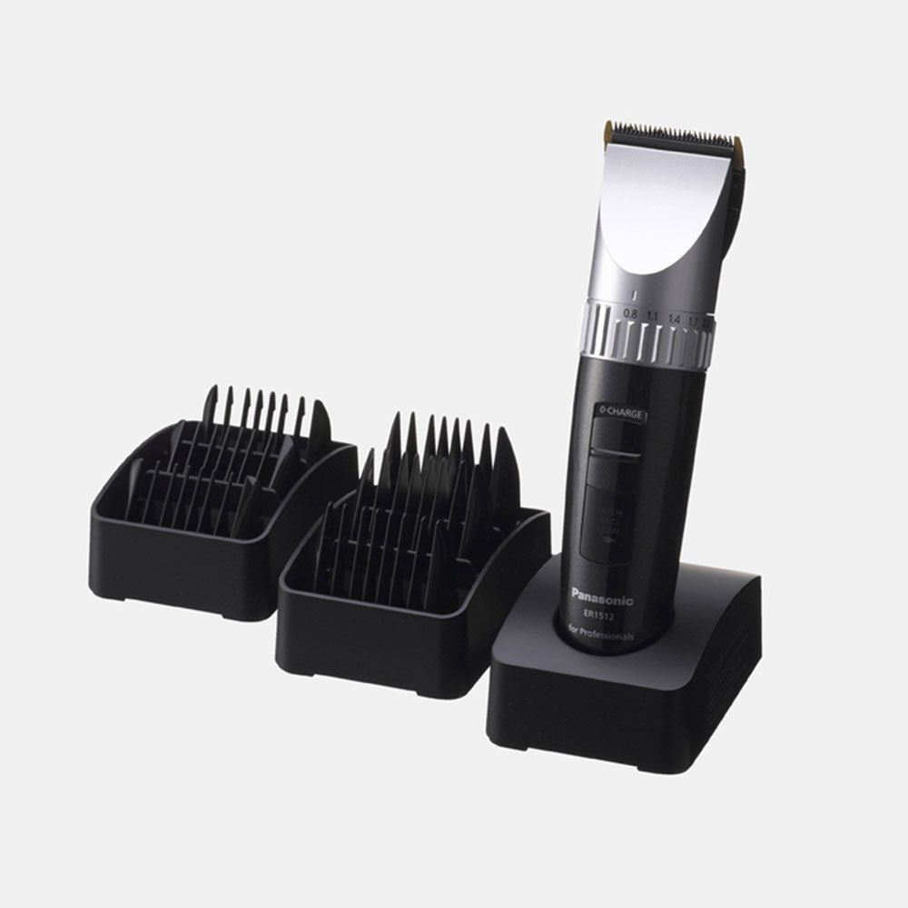 Bart- und Haarschneider mit Ladestation und Aufsätzen. Schwarze Aufsätze. Marke: Panasonic ER1512.