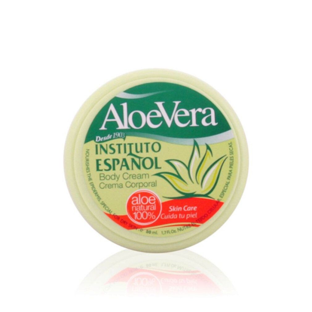 Runder Behälter mit grünem Deckel. Aufschrift: Aloe Vera, Instituto Espanol, Aloe natural 100%. Für trockene Haut.
