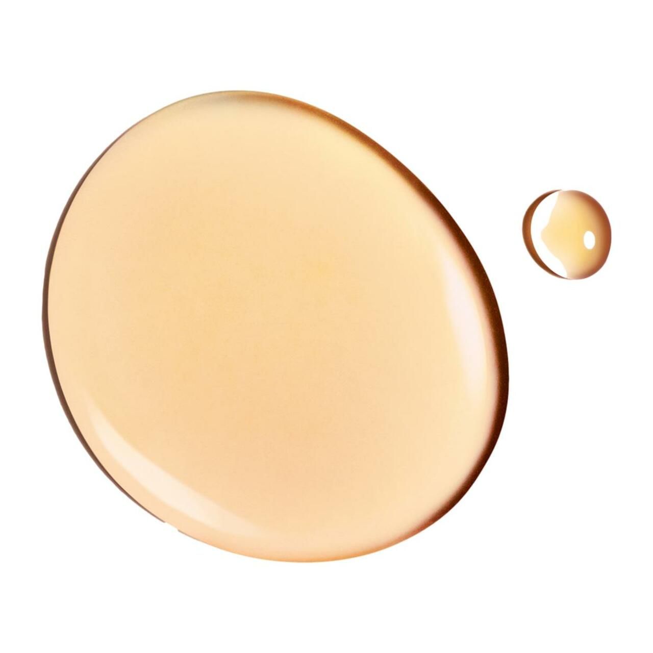 Tropfen Lippenpflegeöl. Honigfarben. Zwei Tropfen.