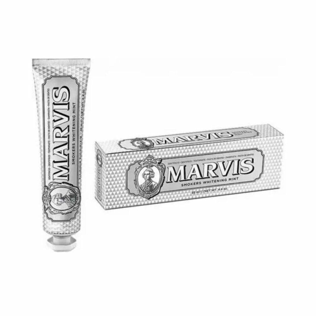 Zahnpasta-Tube und Schachtel. Aufschrift: MARVIS Smokers Whitening Mint. Silberfarben. Weiße Kappe. Verpackung.