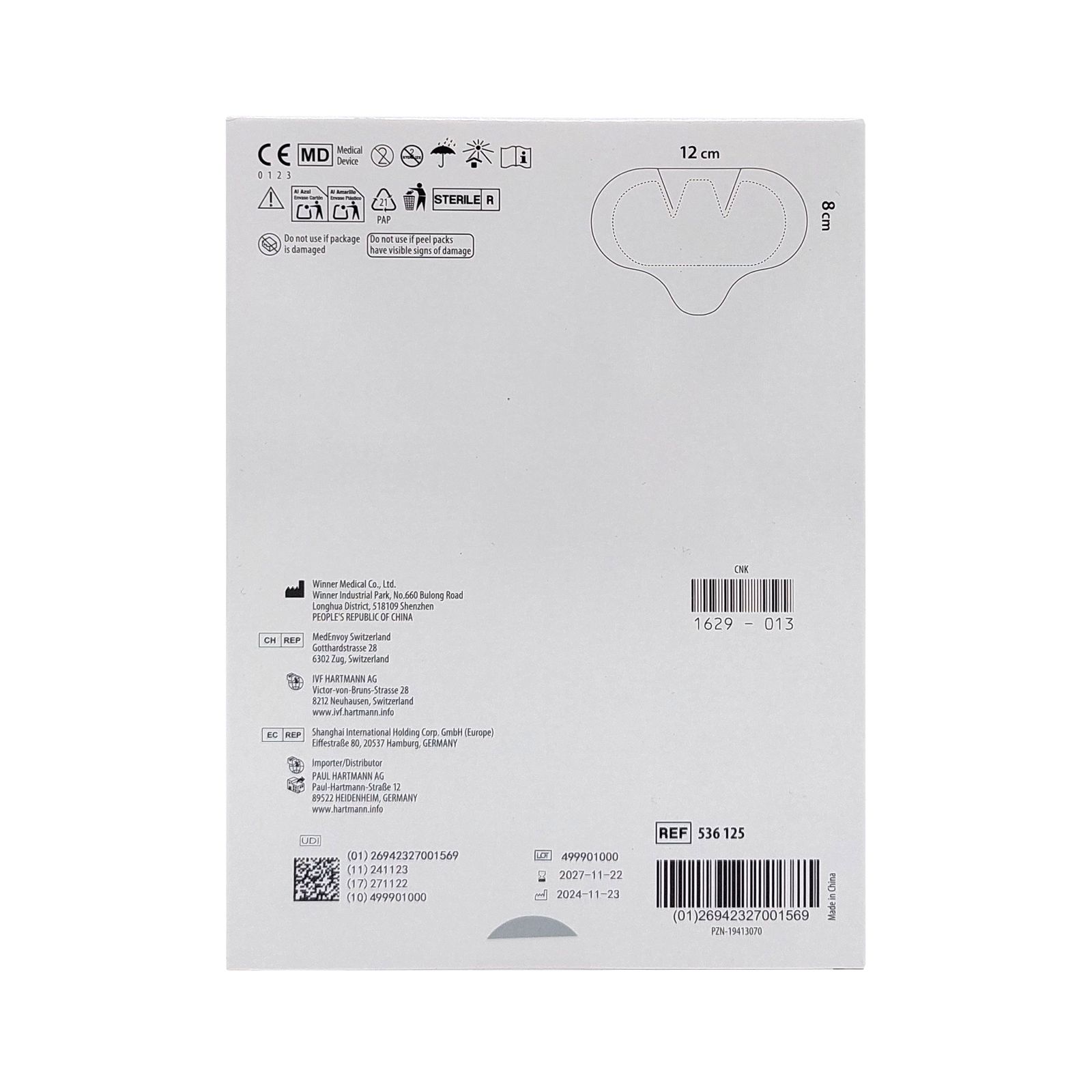 Verpackung mit medizinischem Verband. Maße: 8x12 cm. Rückseite mit Informationen, Symbolen und Barcode.