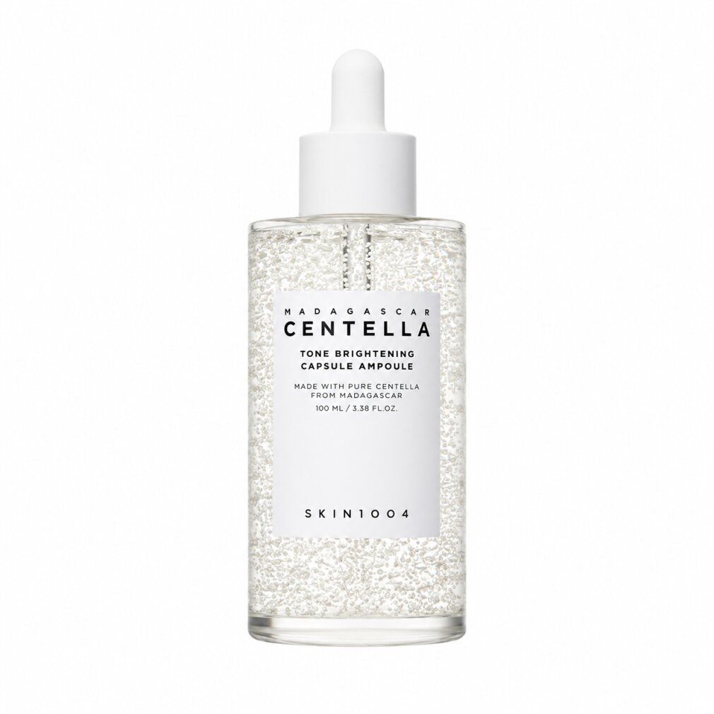 Flasche Madagascar Centella Tone Brightening Capsule Ampoule mit Pipette.