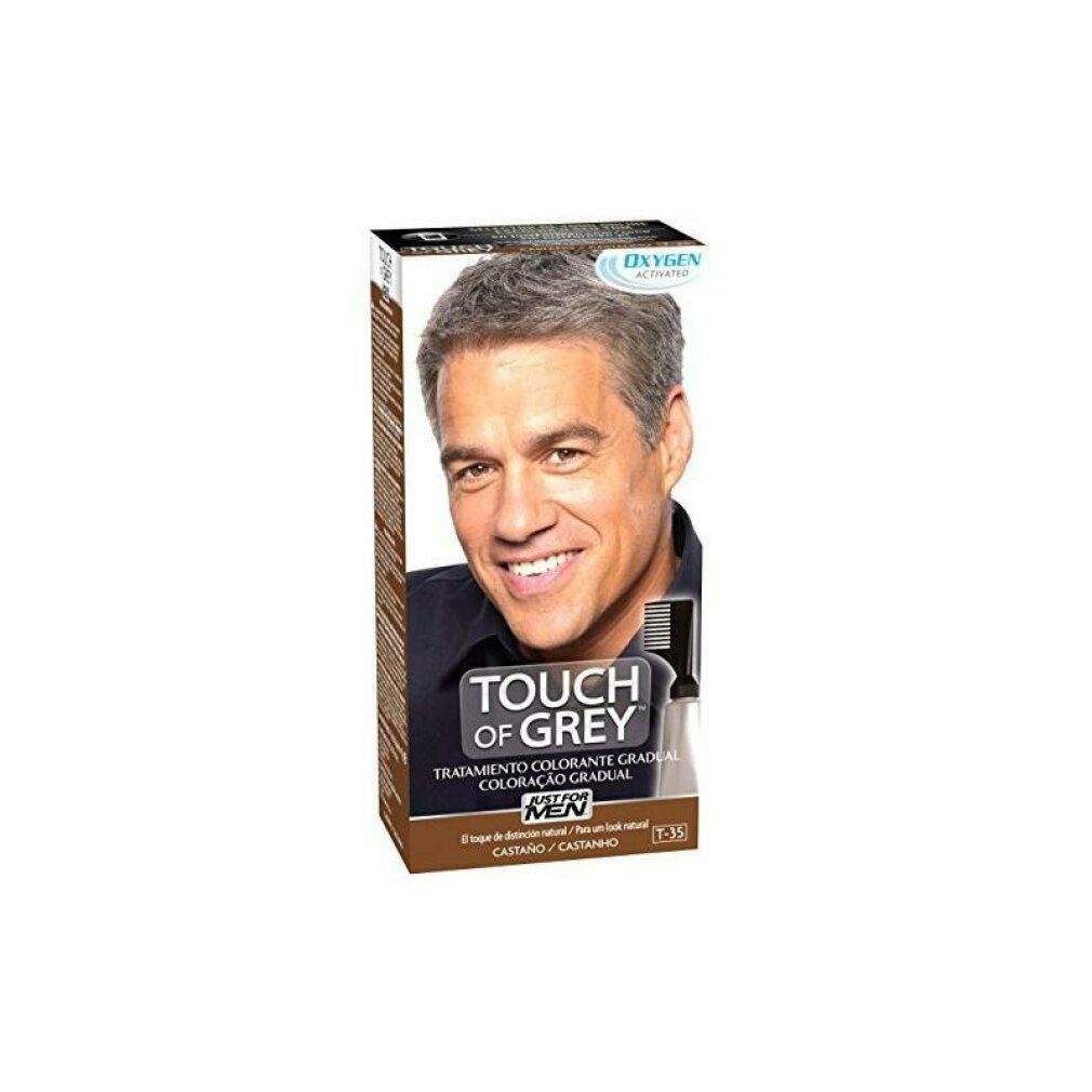 Schachtel "TOUCH OF GREY" von JUST FOR MEN. Abbildung eines Mannes mit grauem Haar. Enthält eine Tube und einen Kamm.