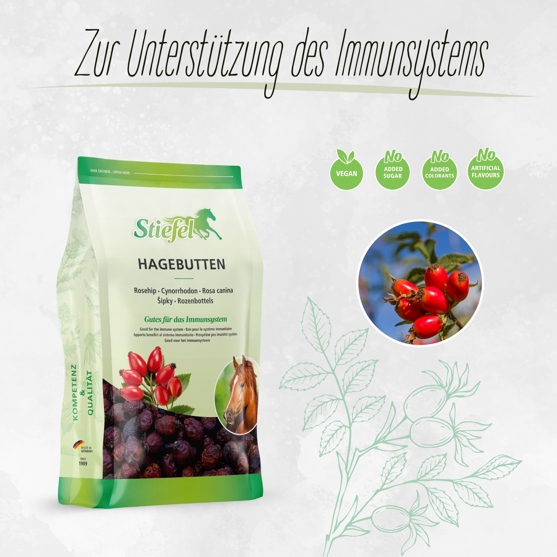 Beutel mit Stiefel Hagebutten. Grün-weiße Verpackung, Produktabbildung, Text: Zur Unterstützung des Immunsystems. Vegan, ohne Zucker, ohne Farbstoffe, ohne Aromen.