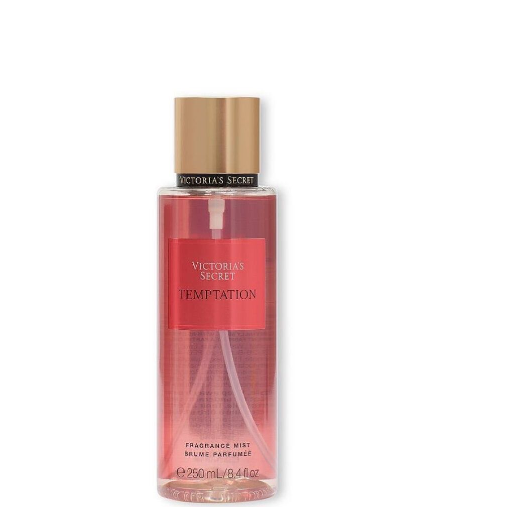 Victoria's Secret Temptation Körperspray. Transparente Flasche, goldener Deckel, Sprühkopf.