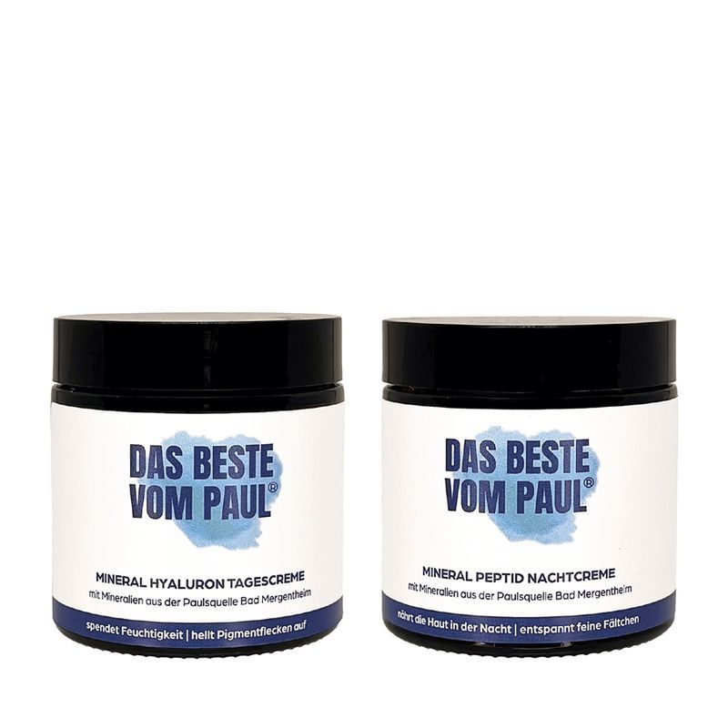 Zwei Tiegel mit schwarzem Deckel. Aufschrift: DAS BESTE VOM PAUL. Mineral Hyaluron Tagescreme und Mineral Peptid Nachtcreme.
