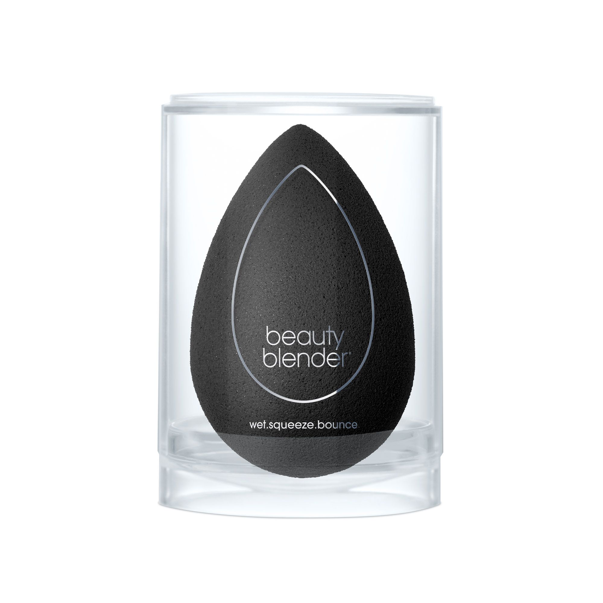 Schwarzer Beautyblender Pro Make-up-Schwamm in einer transparenten, zylindrischen Hülle. Tropfenförmig. Mit silberfarbenem Rand.